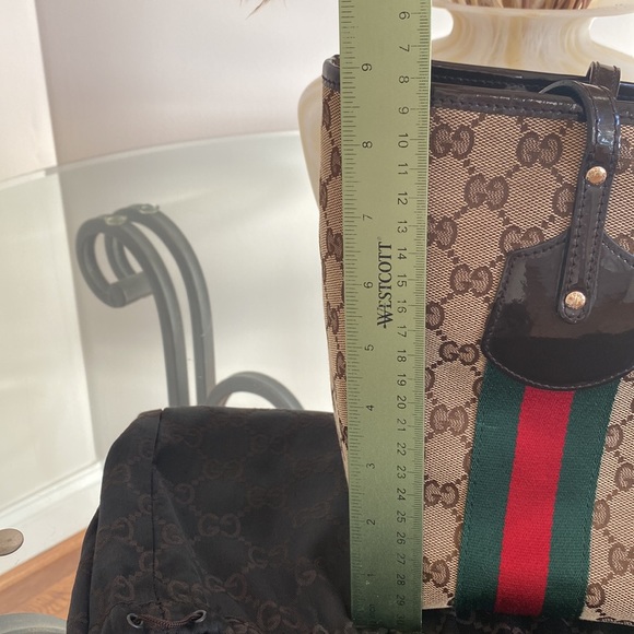 Authentic Gucci brown monogram canvas tote!With three charms.Near perfect! - Picture 13 of 14
